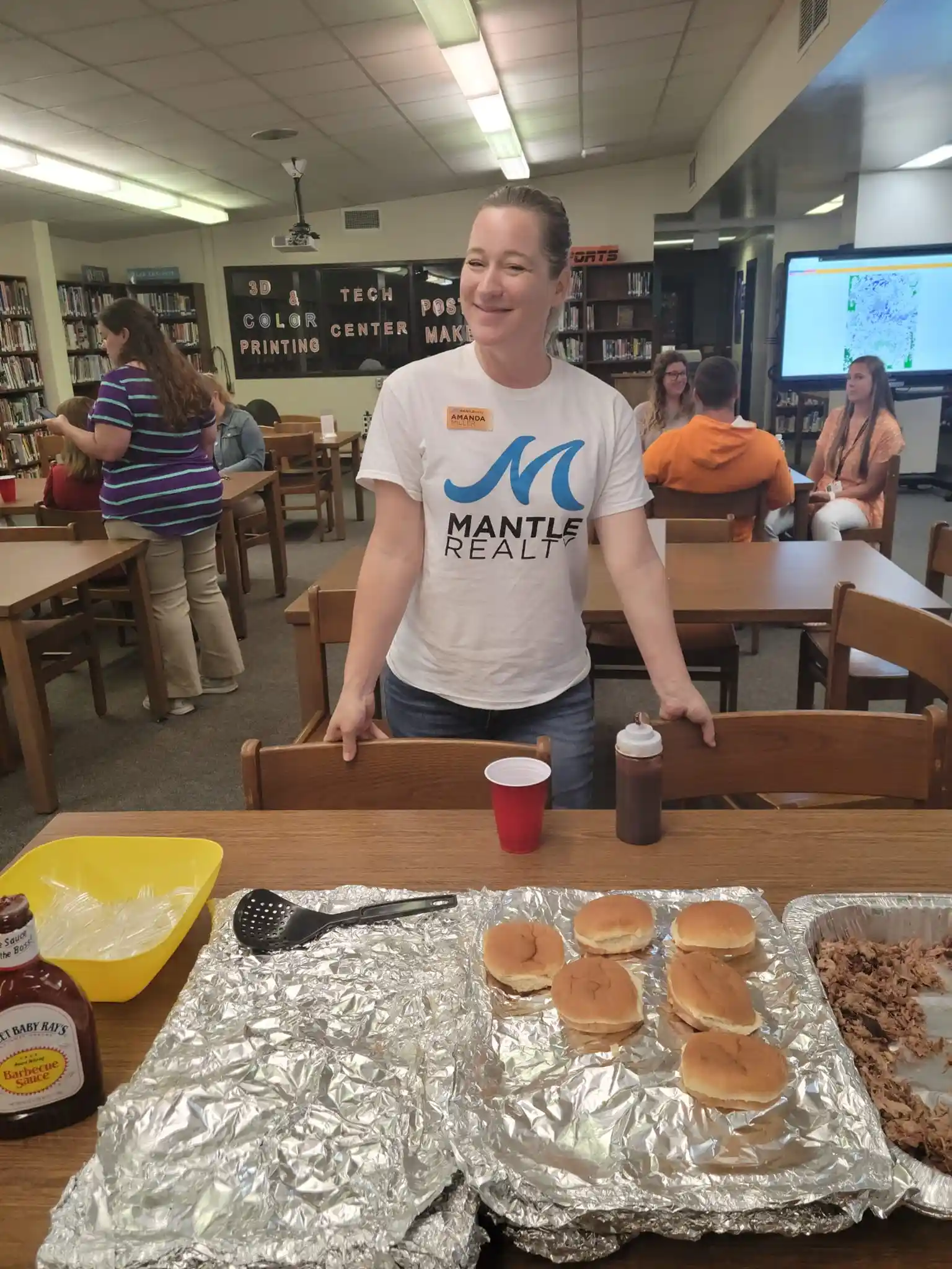 Amanda Miller at a Mantle Realty teacher appreciation community event