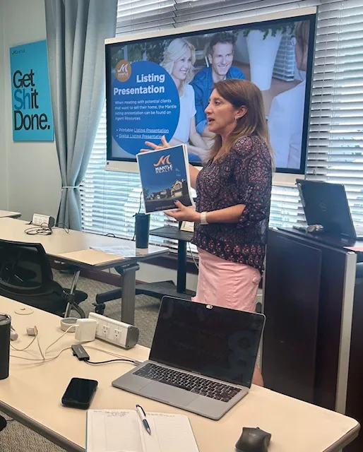 Mantle Realty agents listening during Tuesday morning real estate training in High Point NC