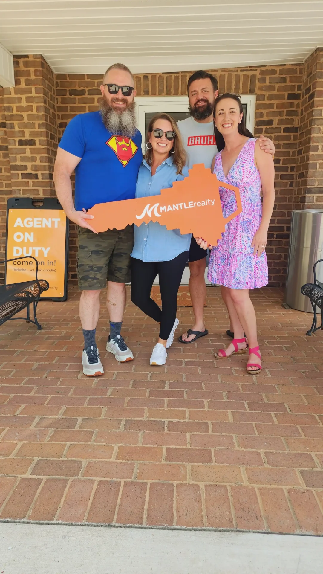 Clients with Mantle Realty at the Welcome office