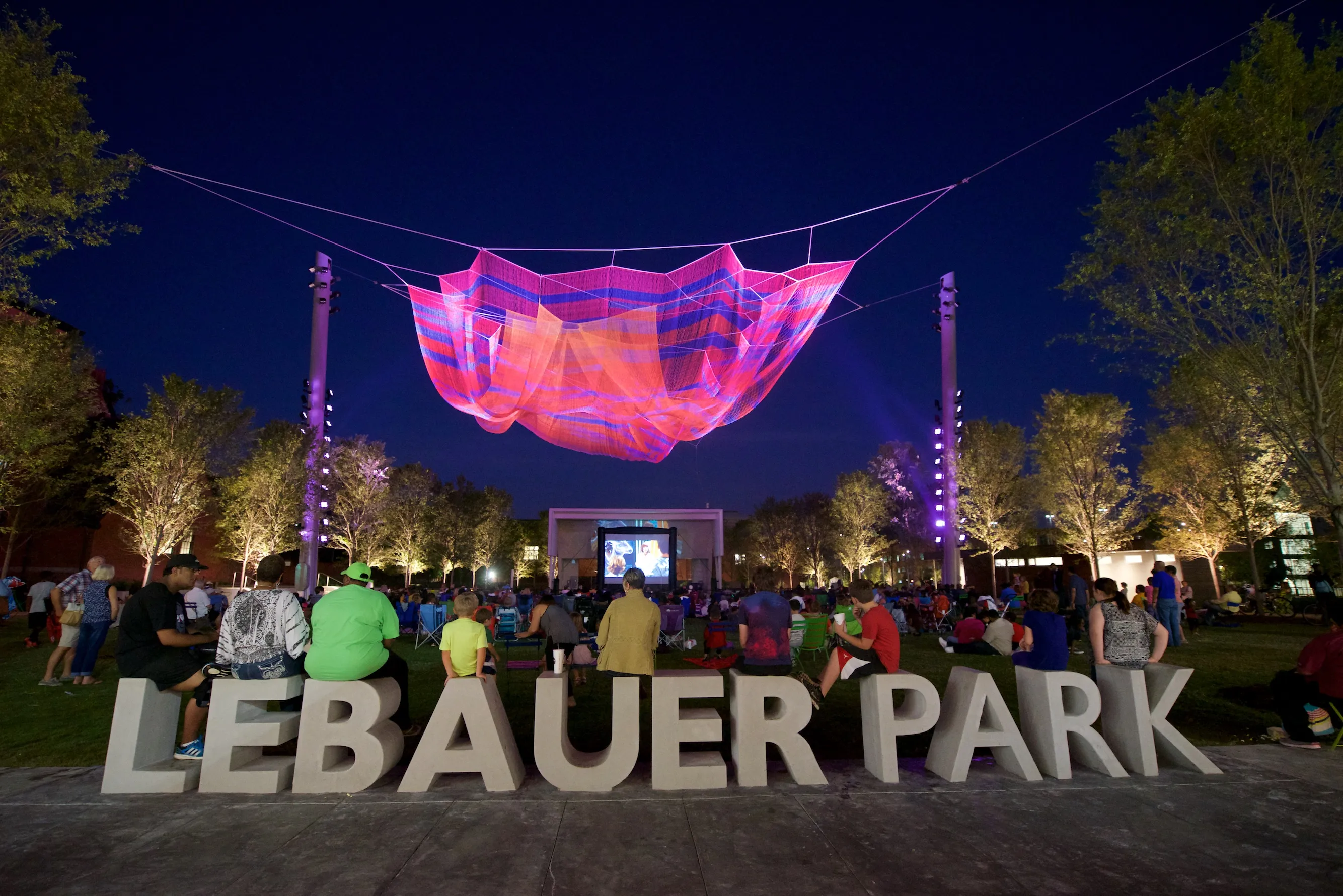 LeBauer Park sign at night in downtown Greensboro North Carolina