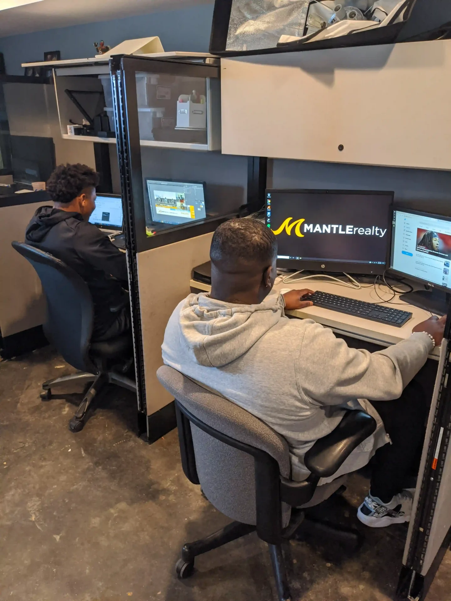 Mantle Realty support staff collaborating in the office