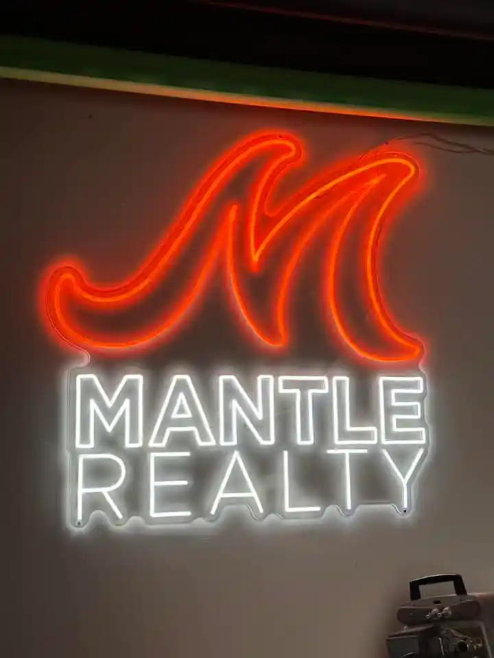 Mantle Realty neon sign