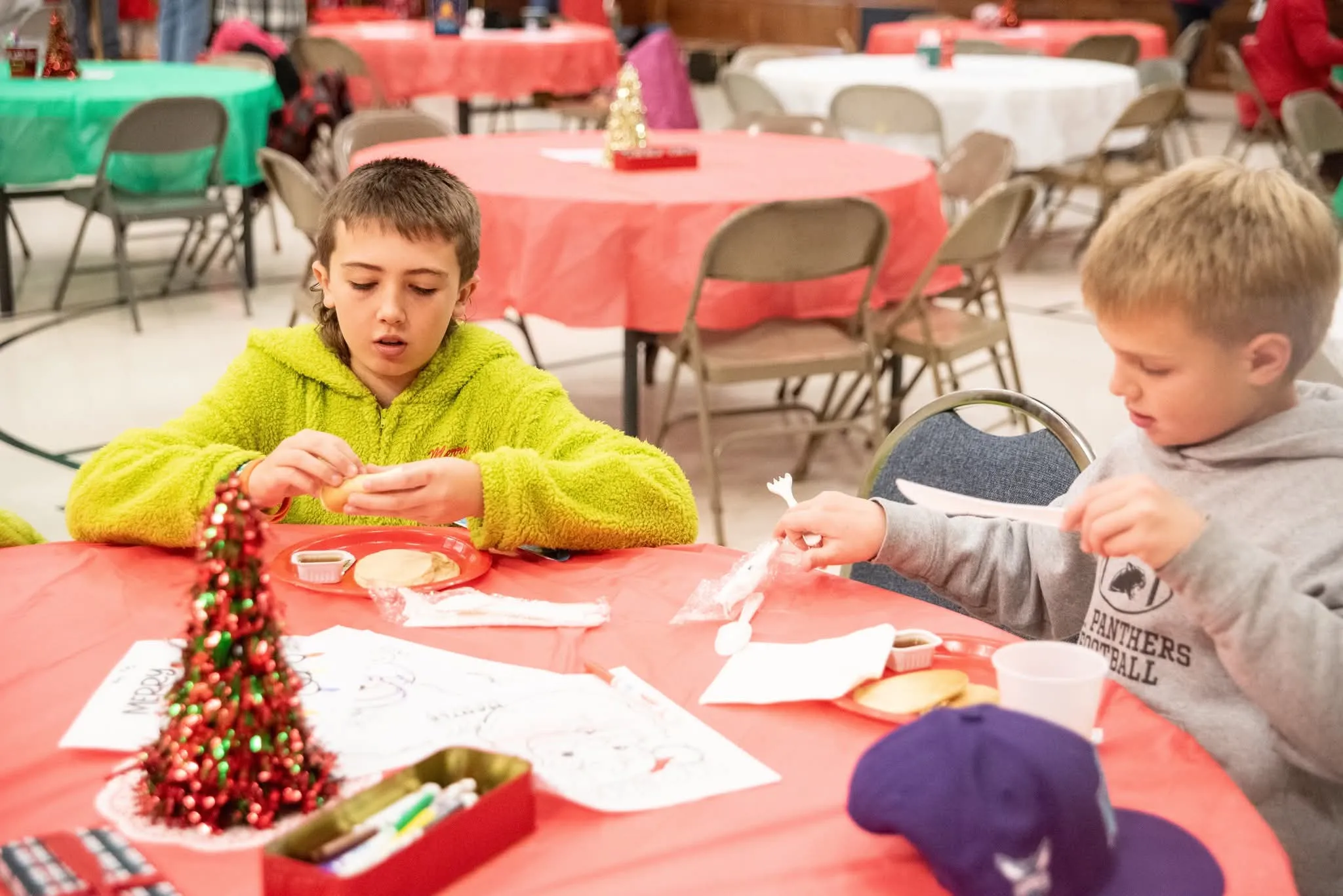 Kids enjoying Pancakes and Pajamas event at Mantle Realty
