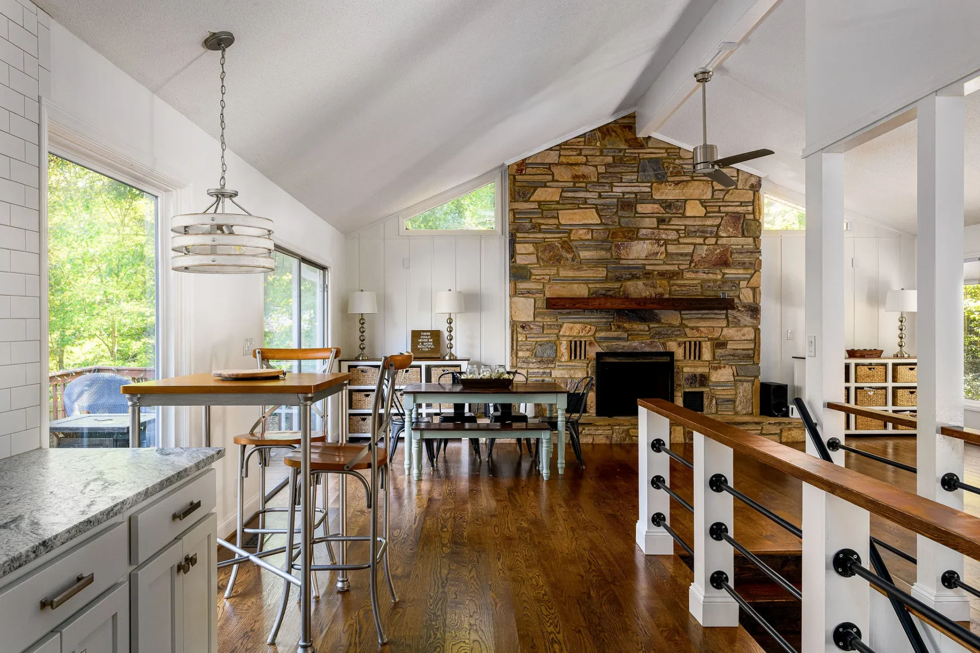 Vaulted great room with stone fireplace in a Triad home