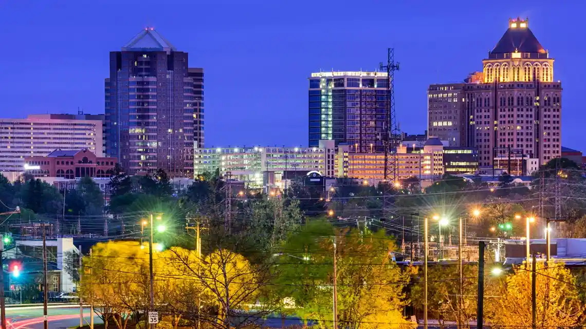 Nighttime skyline view in Greensboro NC