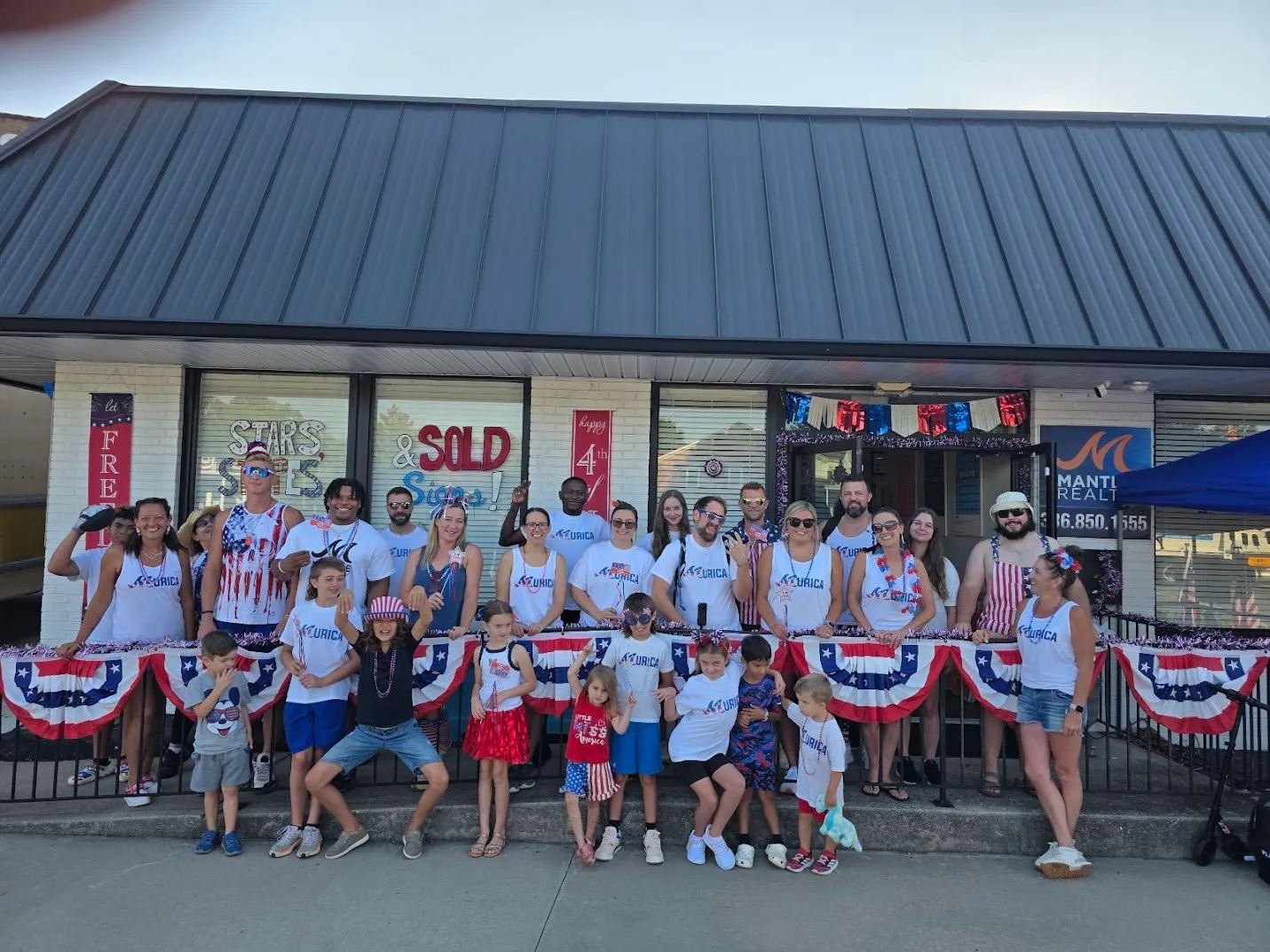 Mantle Realty team participating in the Kernersville Fourth of July parade