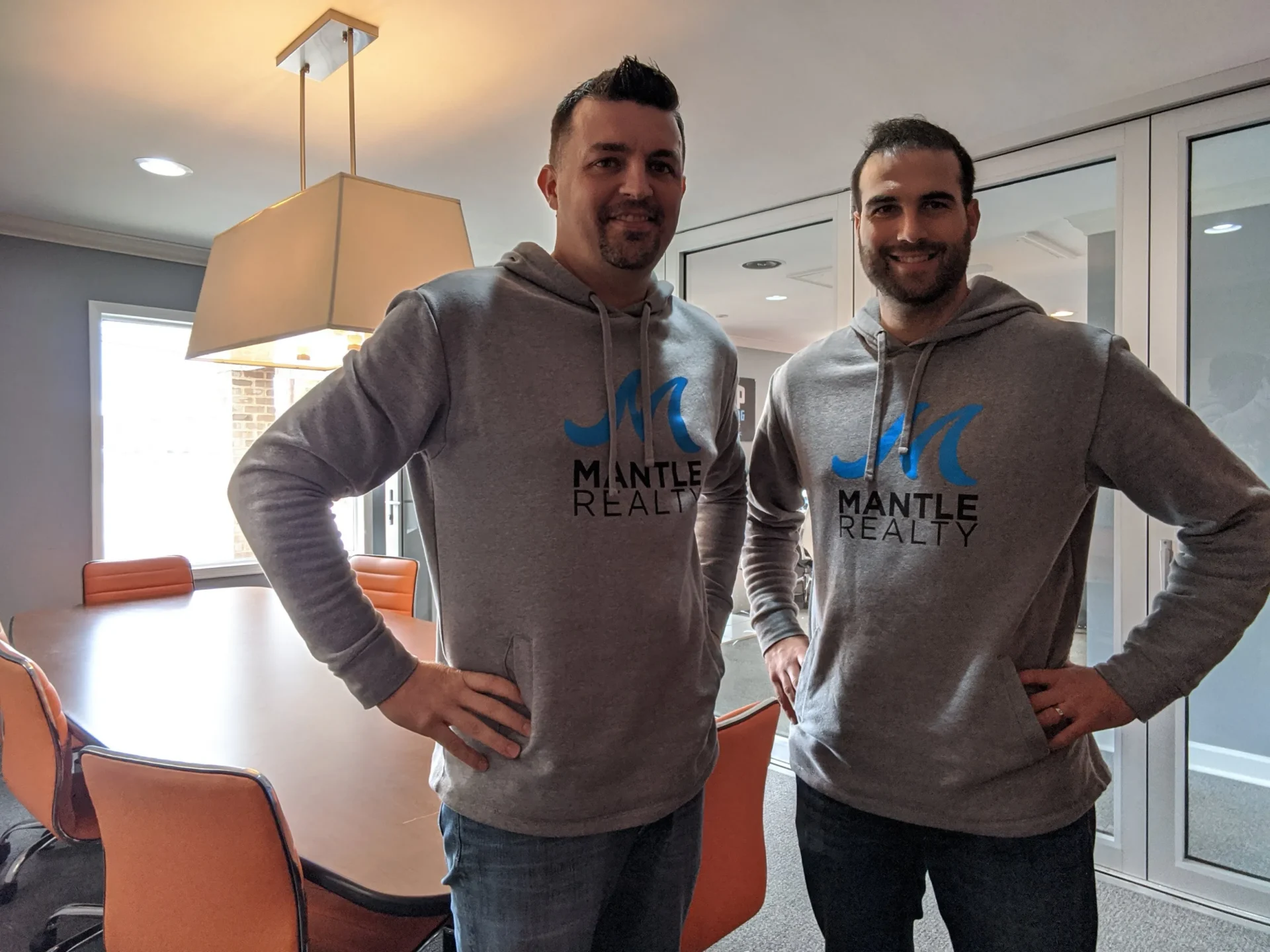 Mantle Realty agents in matching Mantle Realty branded apparel